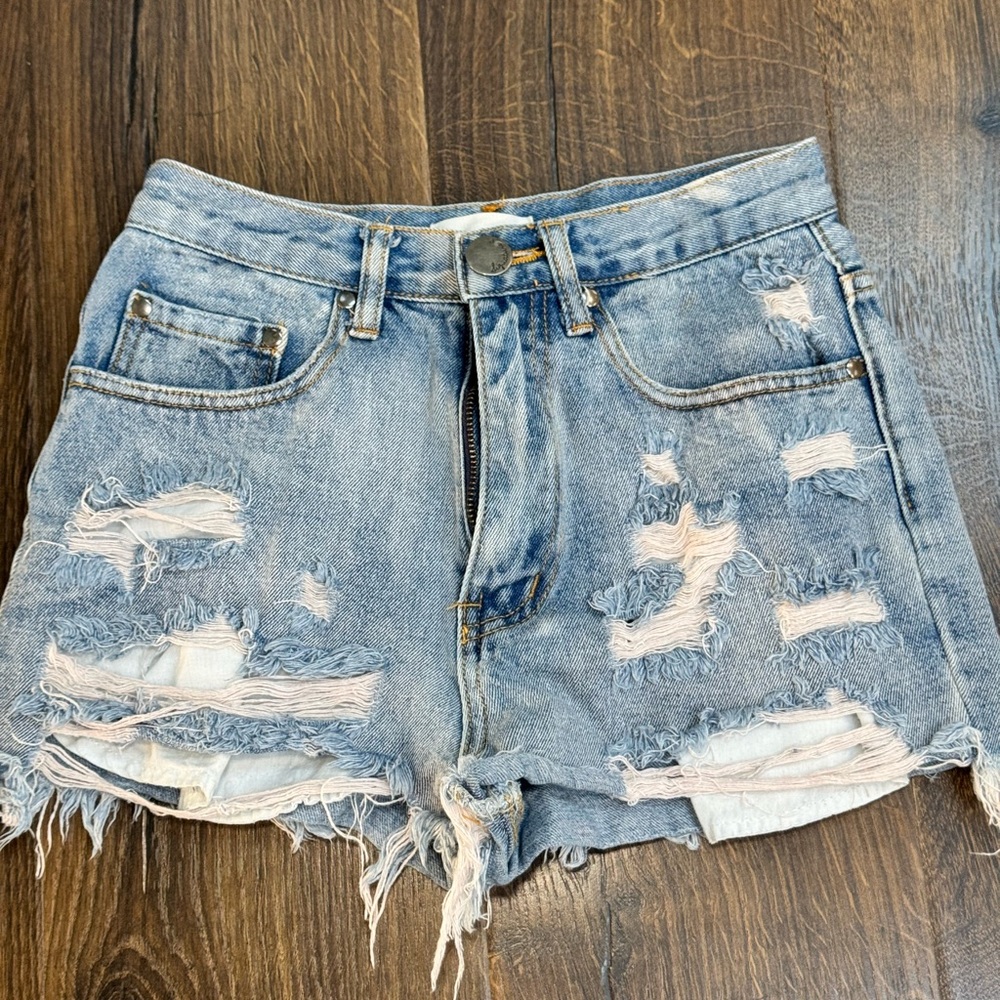 Women’s Light Blue Distressed Denim Jean Shorts with Frayed Hem